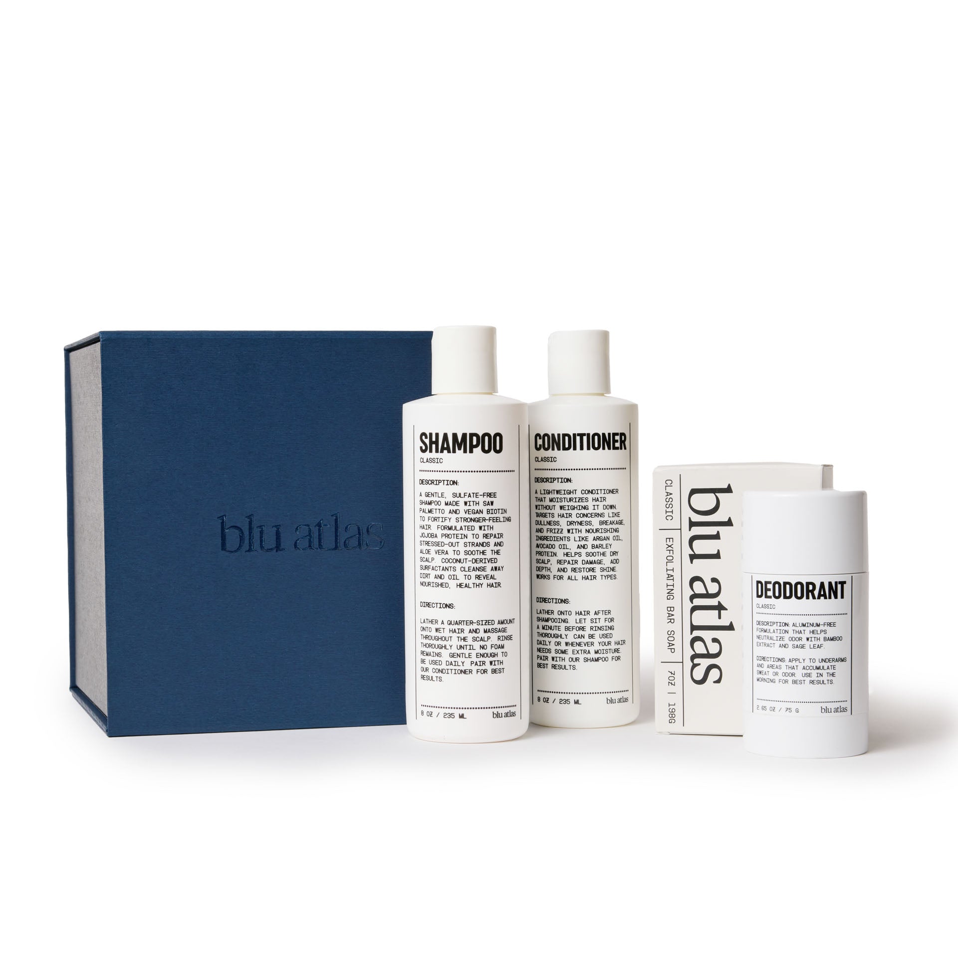 The Blu Atlas Body Care Essentials Set, including shampoo, conditioner, and deodorant, is elegantly displayed beside a dark blue box.