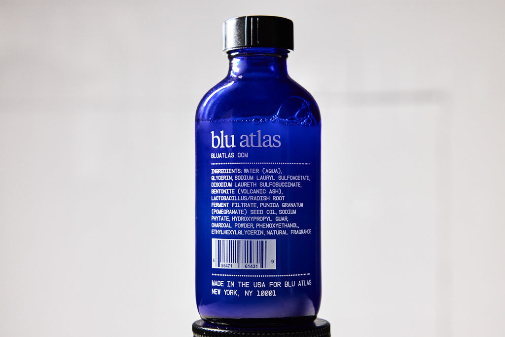 Close up of Blu Atlas Volcanic Ash Face Cleanser on a white background