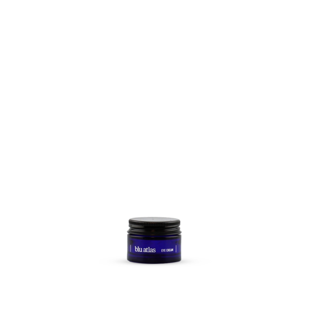 A small dark blue jar of Blu Atlas Brightening Eye Cream, ideal for targeting fine lines and dark circles, with a black lid against a plain white background.