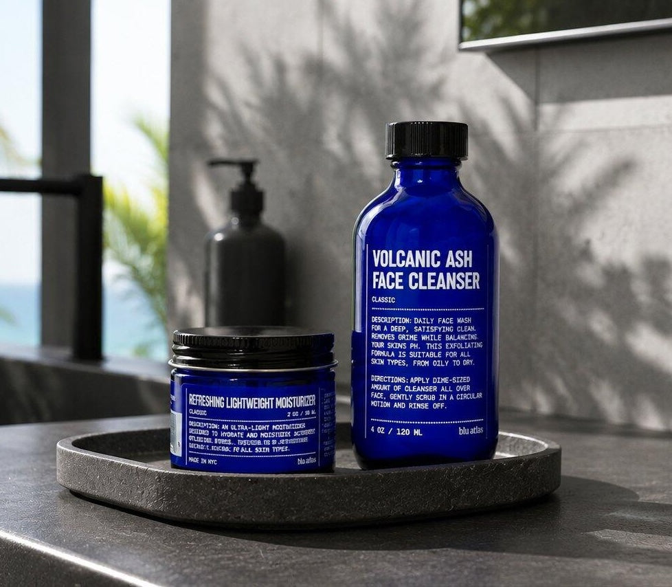 Blu Atlas Volcanic Ash Face Cleanser and Refreshing Lightweight Moisturizer in Marble bathroom