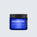 The Blu Atlas Exfoliating Scrub comes in a 2 oz blue jar with a black lid and features a gentle bamboo exfoliant made with hibiscus, jojoba, and bamboo stem.
