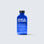 A blue bottle labeled Volcanic Ash Face Cleanser on a light background.