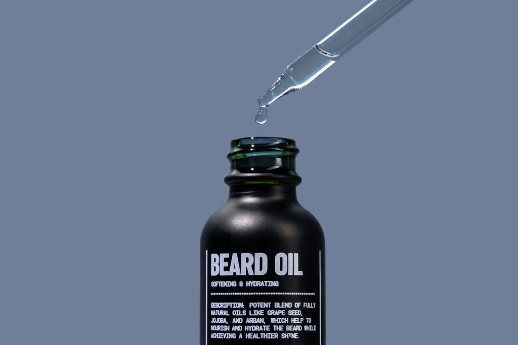 Blu Atlas bread oil black bottle, dropper dripping a drip