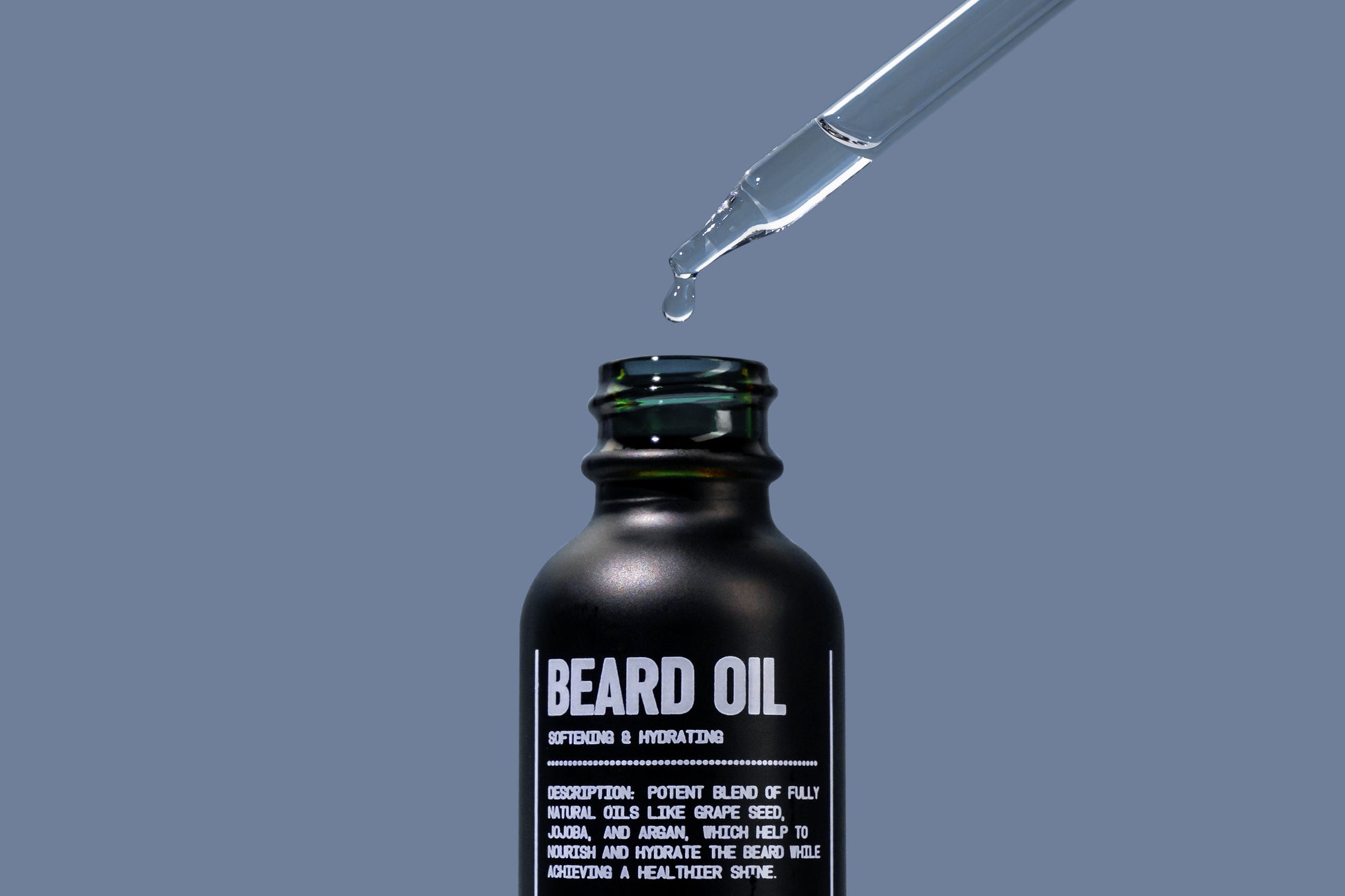 Blu Atlas bread oil black bottle, dropper dripping a drip